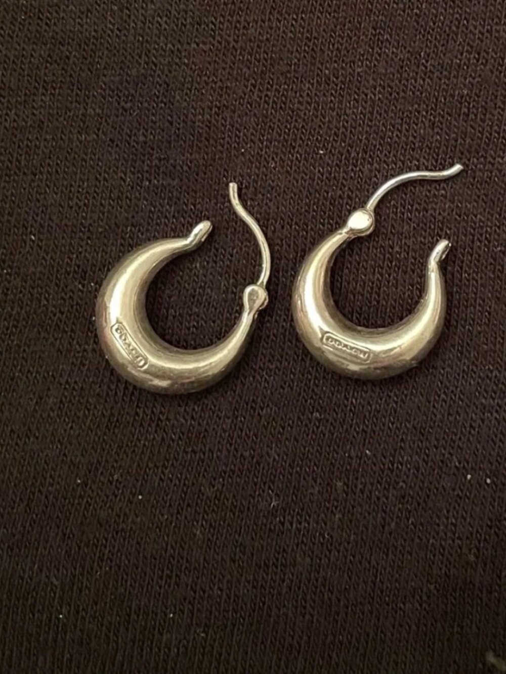Silver huggy hoop earrings Coach